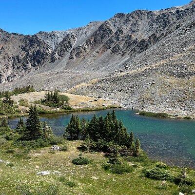 Hike to Nature’s Hidden Gems: Alpine Lake or Waterfall Adventure